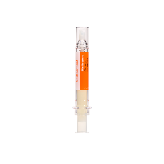 Small cylindrical container with an orange label