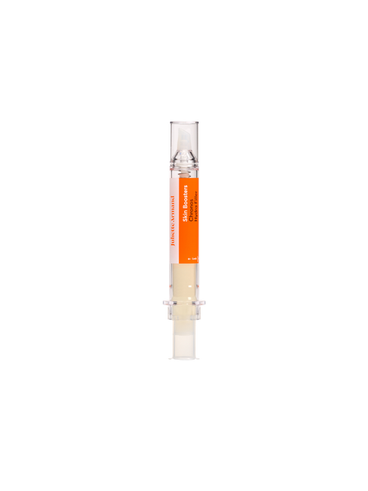 Small cylindrical container with an orange label