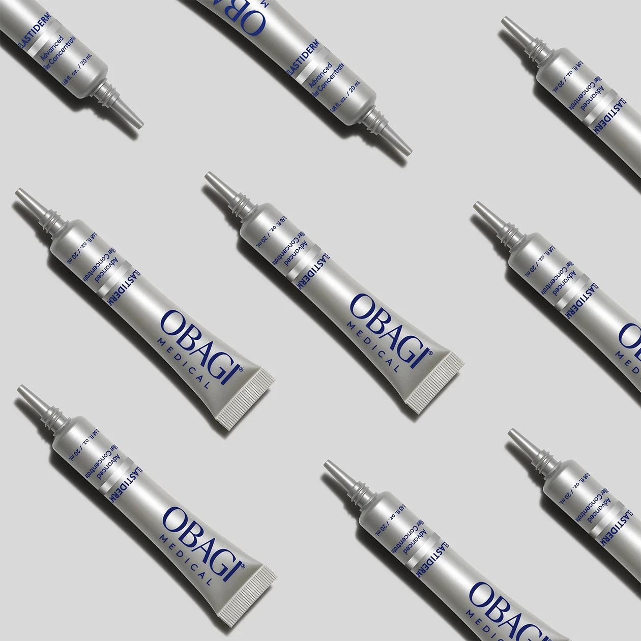 Obagi medical tubes arranged on a light gray background