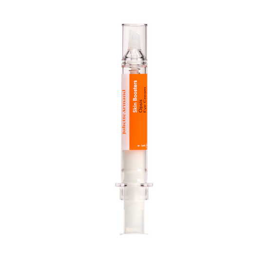 Skincare serum bottle with orange label