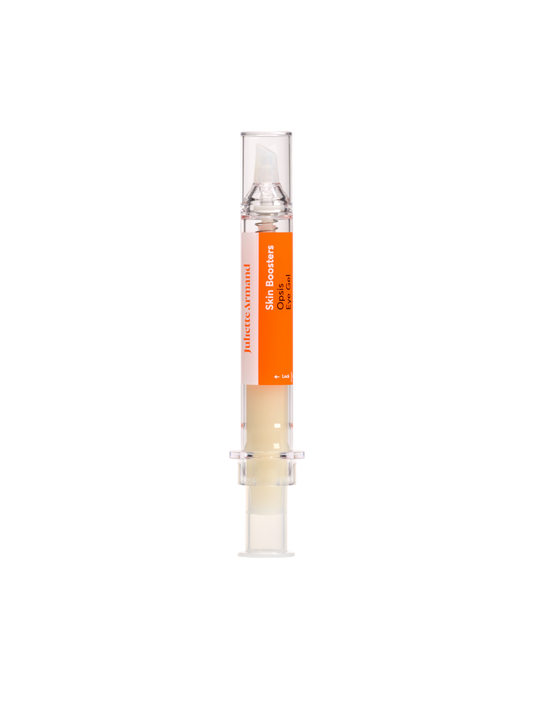 Small cylindrical container with an orange label