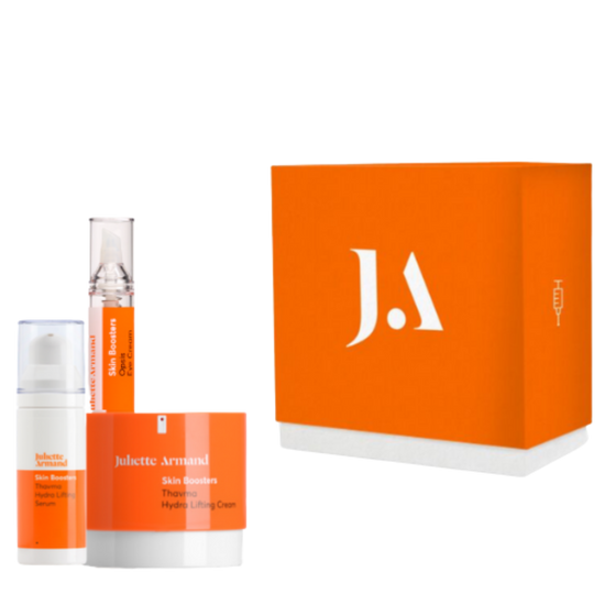 Juliette Armanet skincare products with orange packaging