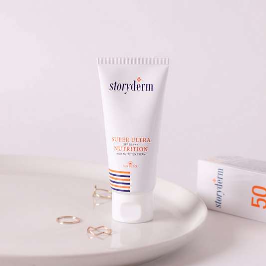 Storyderm Super Ultra Nutrition sunscreen tube on a white surface with a light background