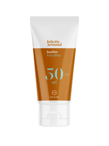 Sunscreen tube labeled 'Juliette Armand' with SPF 50