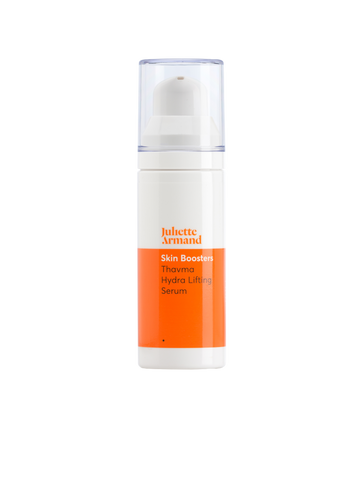 Skincare serum bottle with orange label